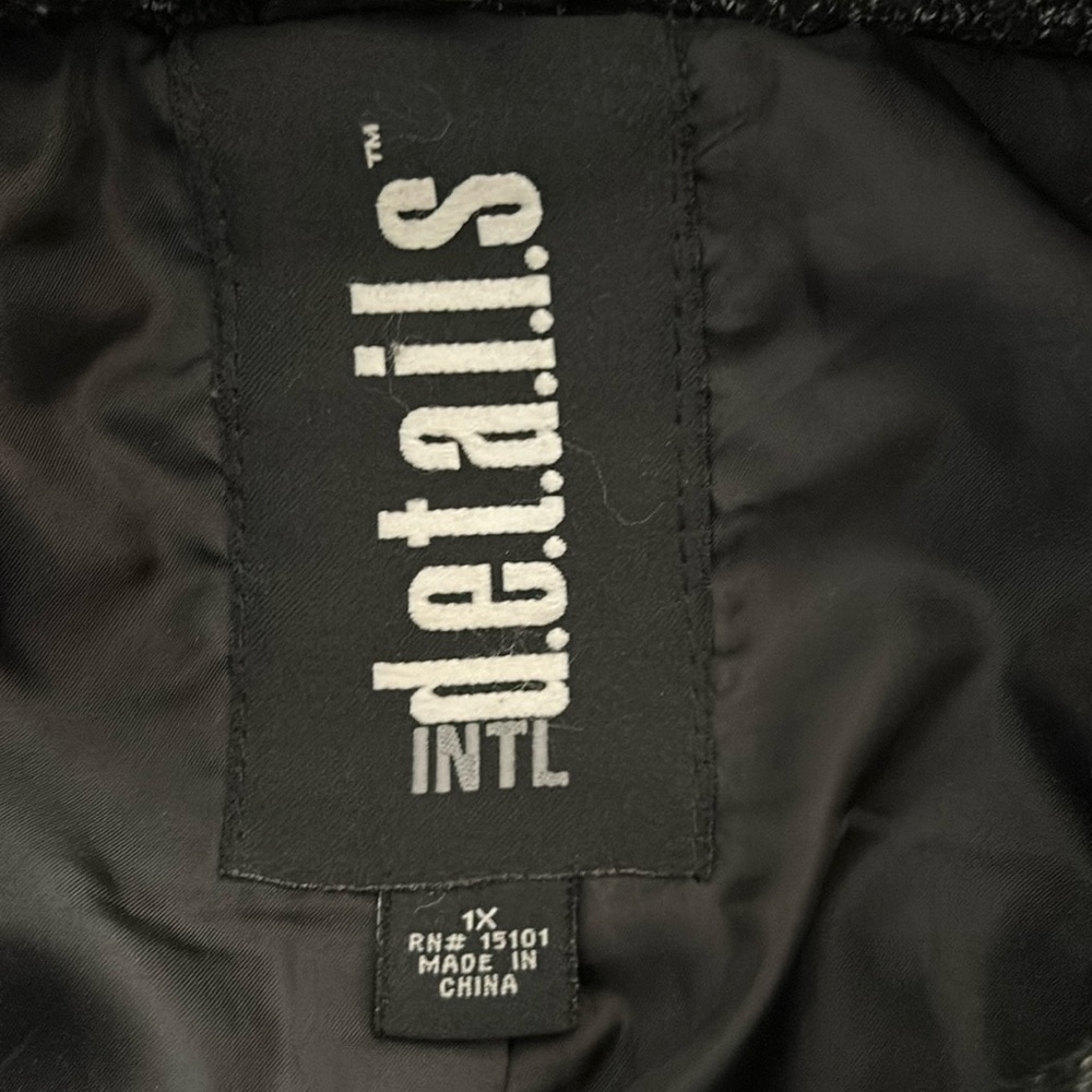 Black Women’s coat medium weight.
